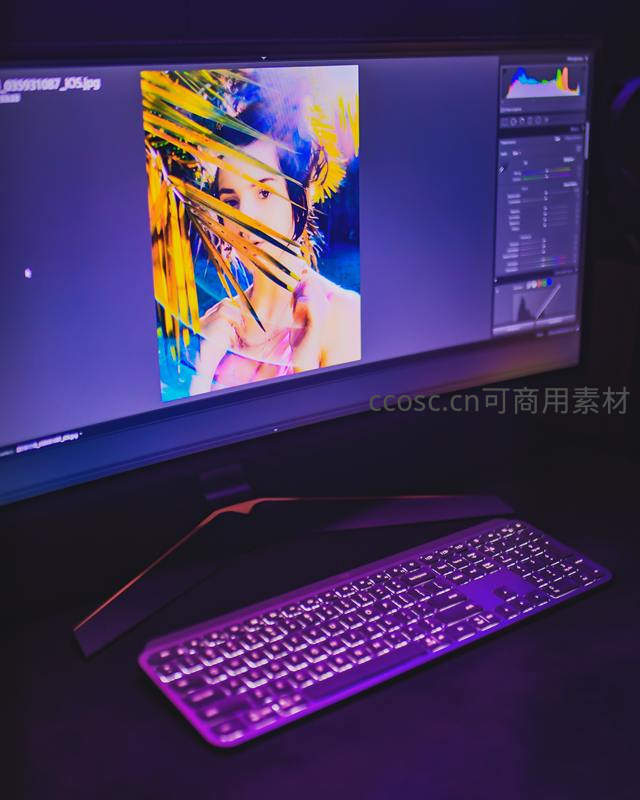 紫色灯光下的专业修图工作站