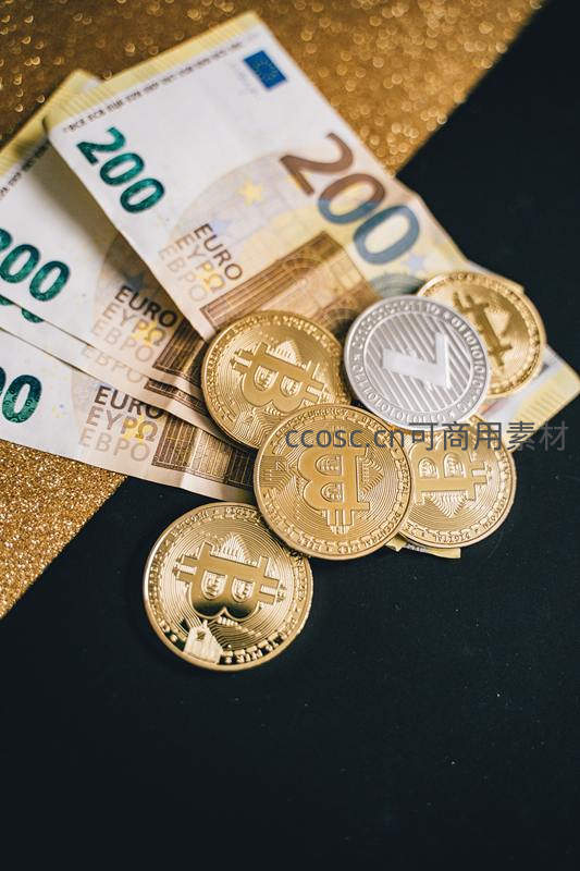 欧元纸币与比特币共存象征传统与新兴货币