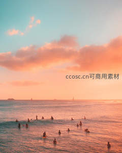 夕阳海面冲浪者剪影群像