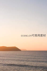 夕阳西下海岬剪影与暖色天空