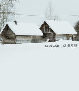 两座木屋隐于茫茫雪原之中