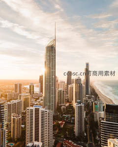 航拍城市天际线高楼林立滨海日落