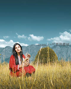 高山草甸上沉思的红衣女子