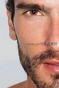 棕色眼眸与胡茬的精致面部特写