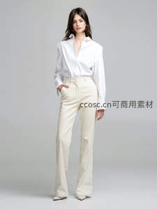 女性模特展示简约通勤穿搭