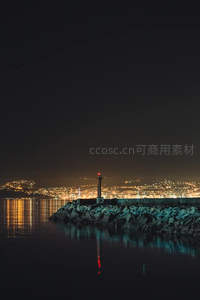 夜幕港湾灯塔星辉倒影