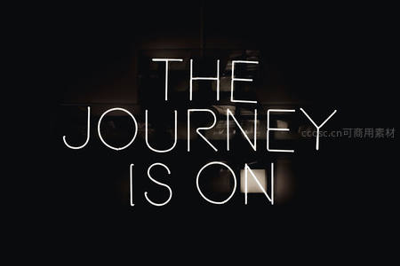 白色霓虹灯标语照亮黑暗空间