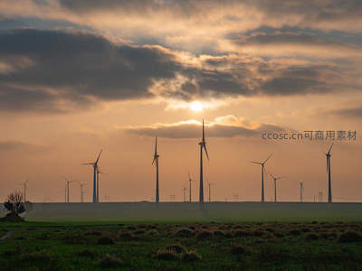 日落时分风车群剪影与云霞辉映