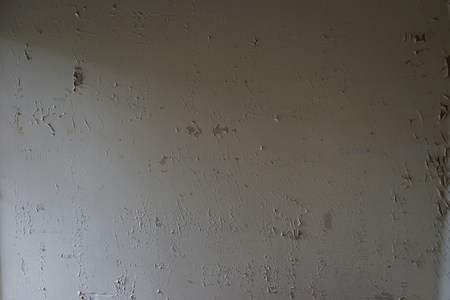 斑驳剥落的老旧墙面特写