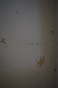 斑驳墙面特写展现岁月侵蚀痕迹