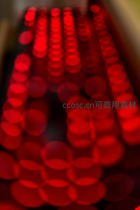 红色光斑虚化背景营造梦幻氛围