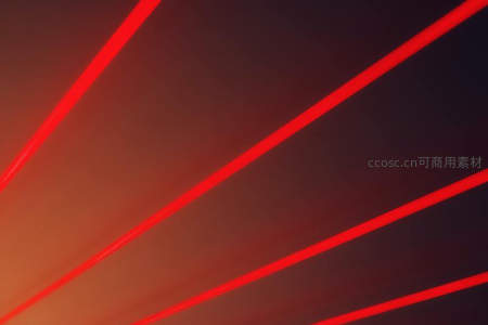 深色背景下斜向红色光束线条