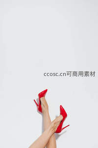 交叉美腿与红色高跟鞋