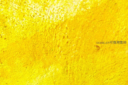 明亮黄色墙面纹理质感特写背景