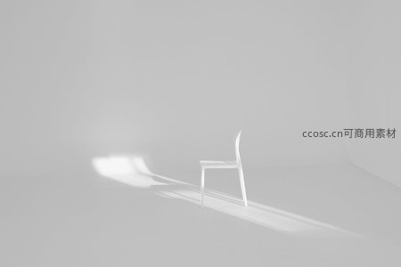 光影中的白色椅子独舞