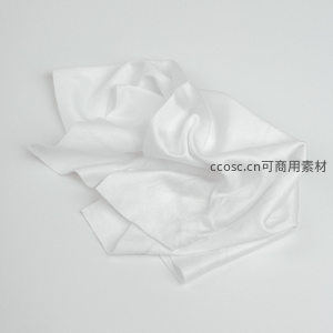 柔光下褶皱的白色丝绸布料特写