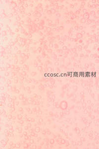 微距镜头下粉色液体中漂浮的气泡群