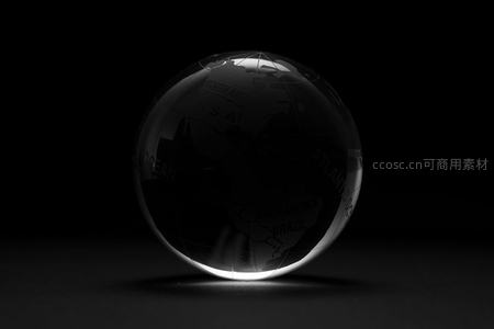 黑色背景下的透明地球仪特写