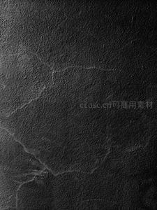 深邃黑色纹理表面，粗糙质感细节特写