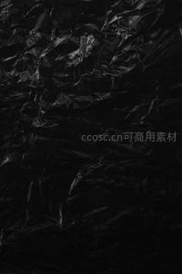 黑色褶皱塑料薄膜纹理背景