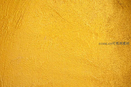 金色纹理墙面特写展现细腻质感与温暖色调
