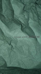 深绿褶皱纸张的立体质感