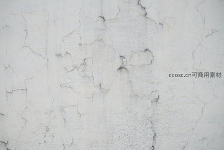 斑驳白墙剥落纹理背景图