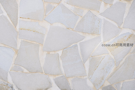 不规则石板拼接墙面，自然粗犷质感