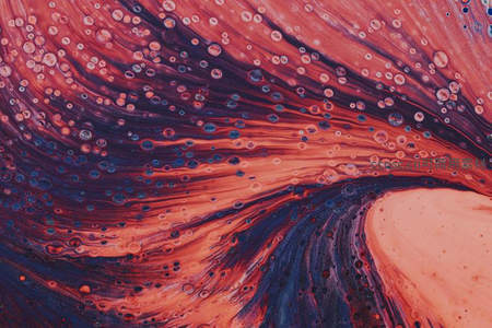 橙红波浪中漂浮的透明气泡