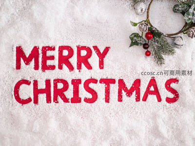 雪地红色圣诞祝福语与装饰花环