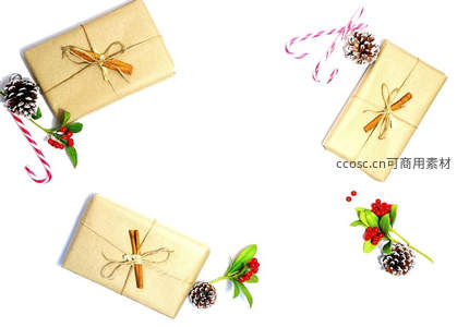 牛皮纸礼盒与松果拐杖糖的平面构图