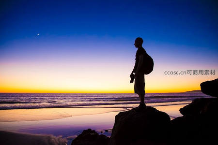 海边岩石，剪影凝望月升日落