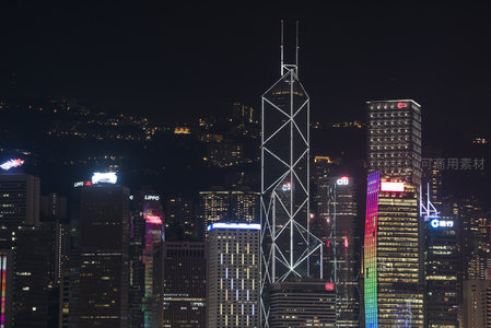 中银大厦夜景特写，钢架结构与彩色灯光交织的现代美学